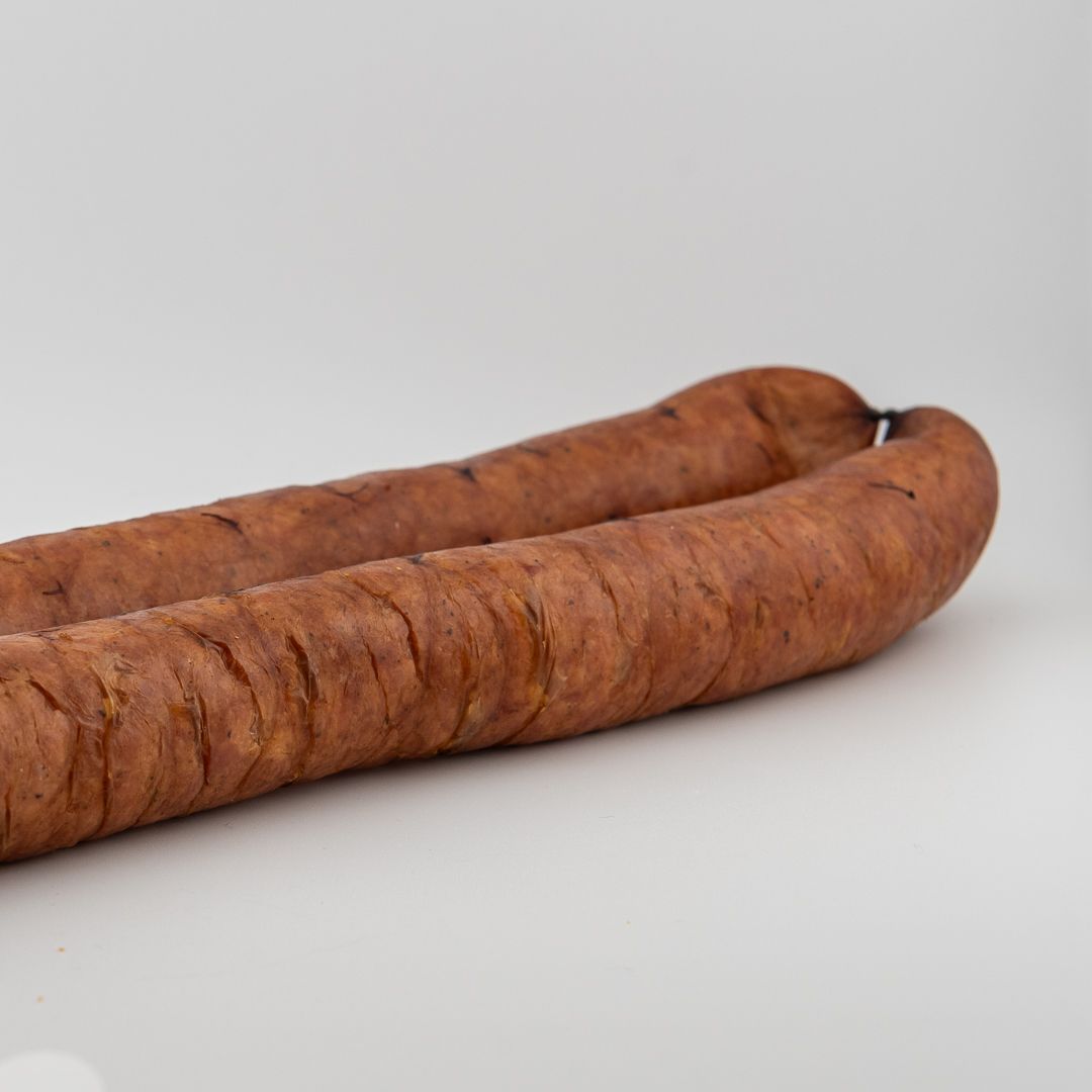 Freshly packaged country-style smoked sausage