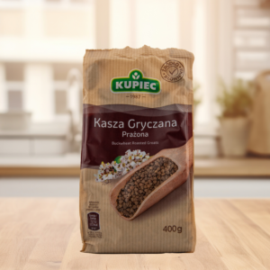 Buckwheat roasted groats by Kupiec, 400g package on kitchen counter