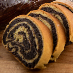 Handcrafted poppy seed roll cake filled with rich poppy seed paste