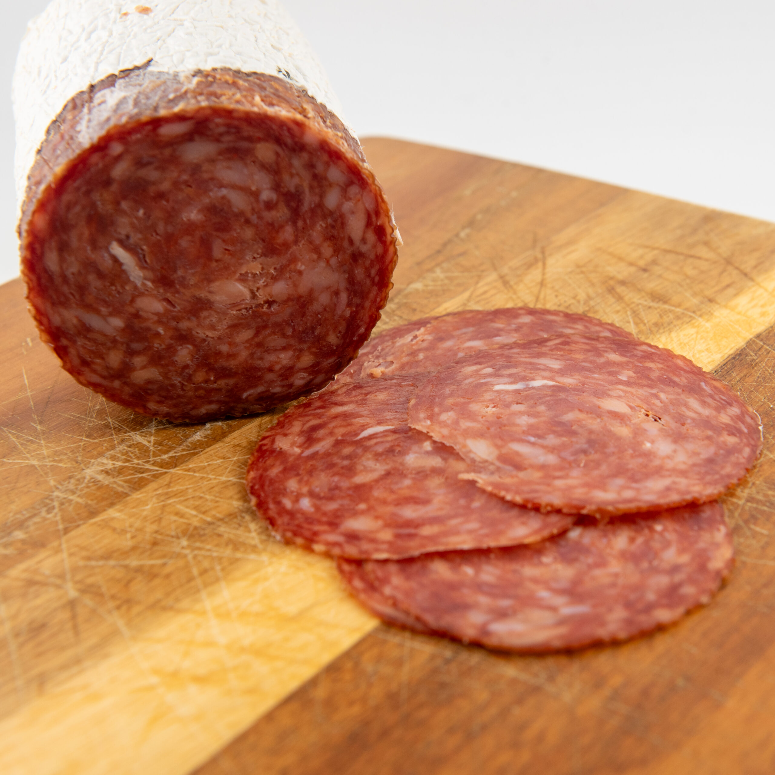 Spicy Hungarian salami platter with bread and cheese